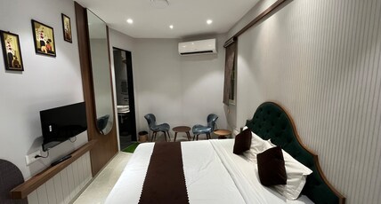 Prime Boutique Stay Room Type - Deluxe AC Room w Parking