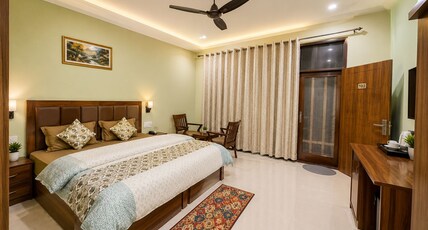 AASRA PARADISE HOTEL Room Type - Deluxe Room with Balcony | Garden View