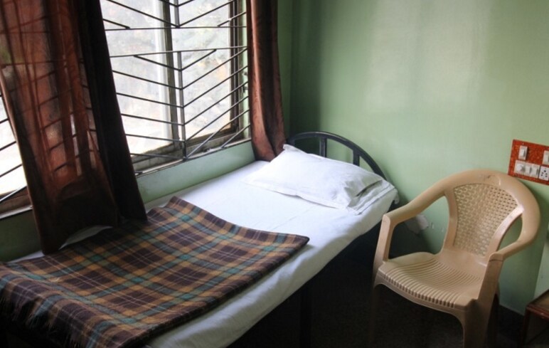 New Adarsh Lodge - Tap to explore photos