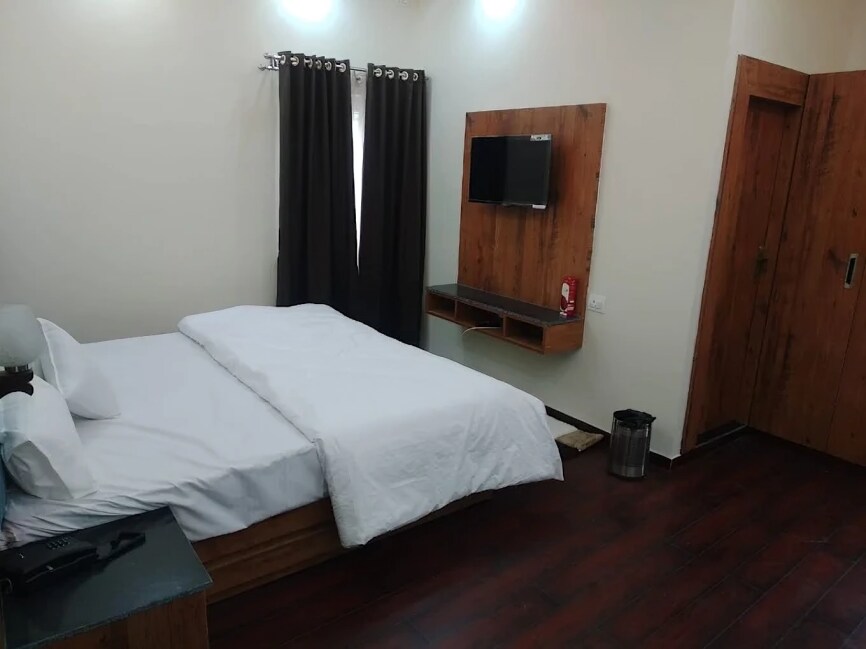 Hotel Devlok Inn - Tap to explore photos