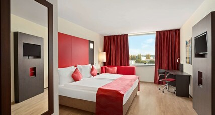 Ramada Encore by Wyndham Geneva Room Type - 1 King Bed Room with Sofa Bed, Non-Smoking Ramada Encore by Wyndham Geneva Room Type - 1 King Bed Room with Sofa Bed, Non-Smoking
