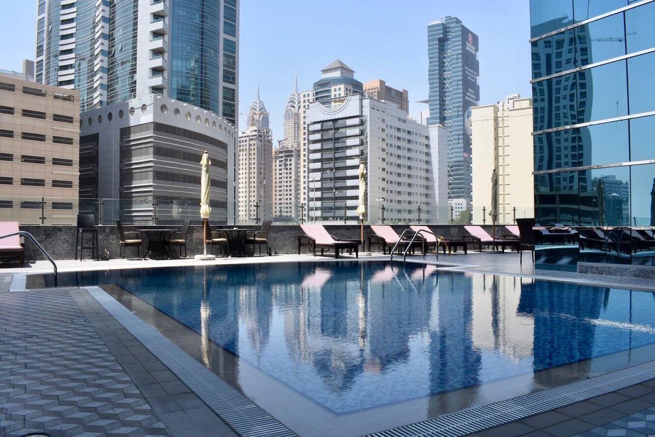 Golden Tulip Media Hotel - Tap to explore photos