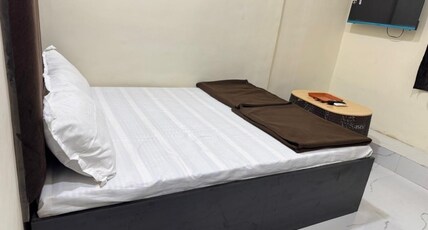 KMC GUEST HOUSE AND DORMITORY Room Type - Deluxe Room with City View Bed