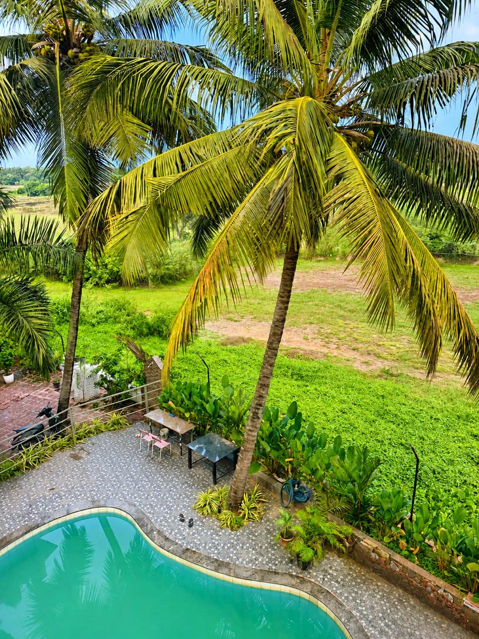 Ryans Palm Grove | 2 BHK Stay - Tap to explore photos