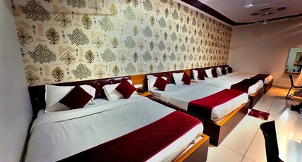 Hotel Santosh Palace (Free Gated Parking & 10 Minutes walk from Temple) Room Type - Grand Family Room for 8 Pax - 4 King Beds with 2 Bathrooms Hotel Santosh Palace (Free Gated Parking & 10 Minutes walk from Temple) Room Type - Grand Family Room for 8 Pax - 4 King Beds with 2 Bathrooms