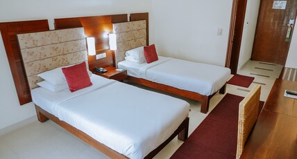 Hotel Devaragam by KP Namboodiris Room Type - Deluxe Twin Bed