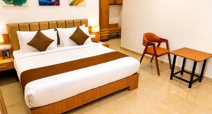 SUBURBAN RESIDENCY Room Type - Deluxe Room with Garden View