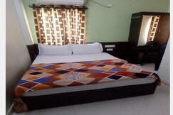 Rooms of Hotel Happy Nest