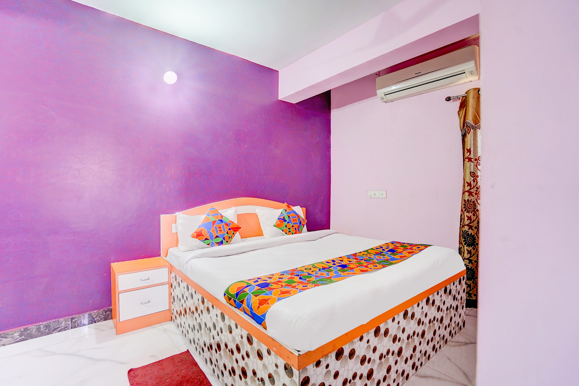 FabHotel Triotel Inn - Tap to explore photos