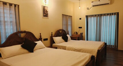 Coastal Calm Inn Room Type - Family AC Room with Balcony(4pax)