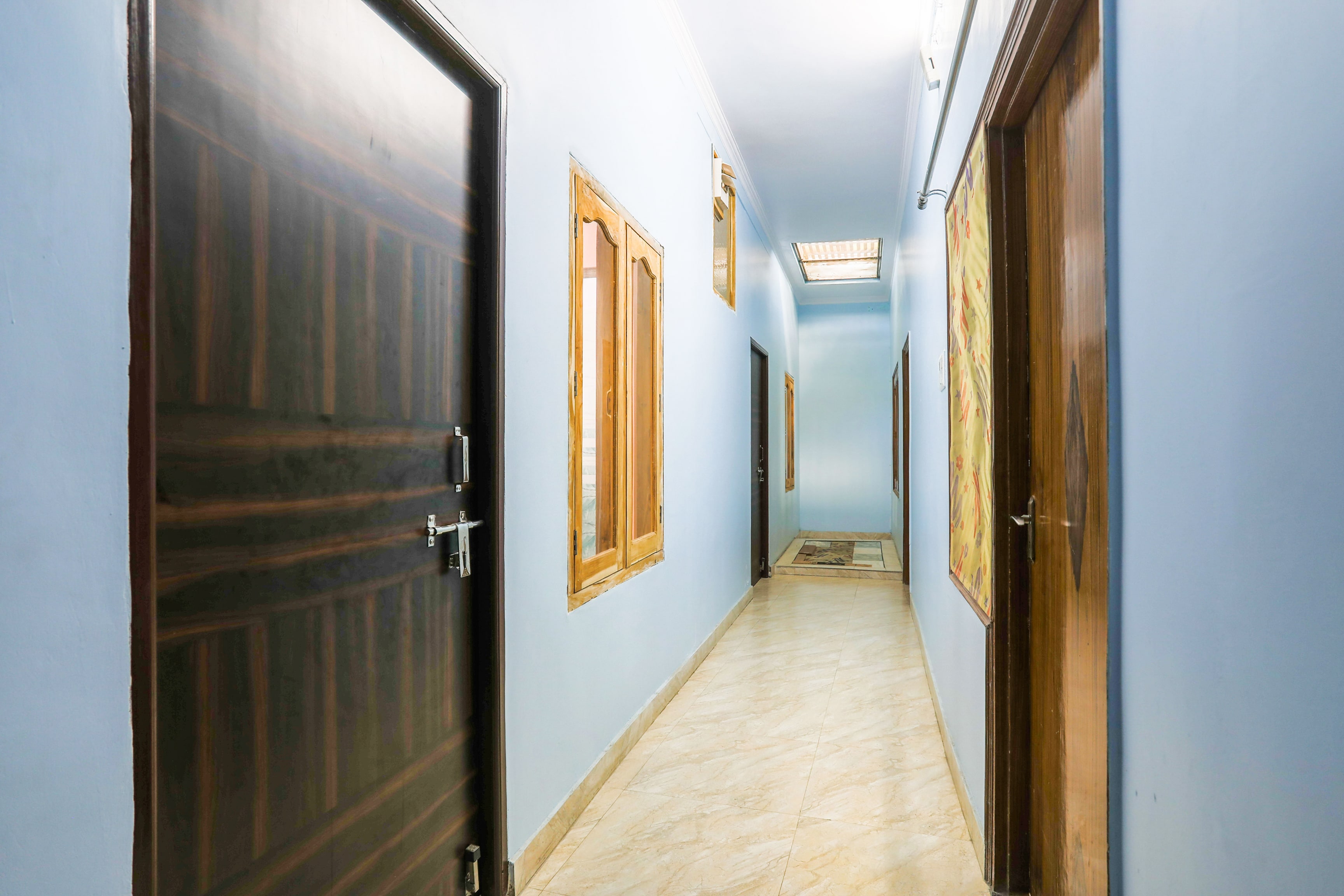OYO HOME Blue Heaven Residency - Tap to explore photos