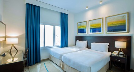 Radisson Blu Resort, Fujairah Room Type - Two Bedroom Suite - Two Bathrooms Radisson Blu Resort, Fujairah Room Type - Two Bedroom Suite - Two Bathrooms