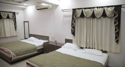 Guruprasad hotel Room Type - Bedroom 1