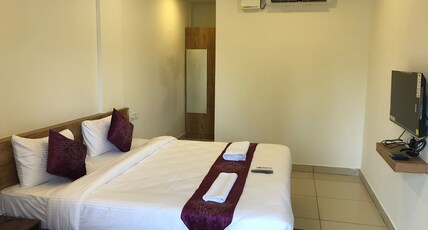 Hotel Amulya Regency Room Type - Deluxe Room