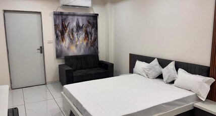 HOTEL YOGIRAJ Room Type - King Bed Room with City View