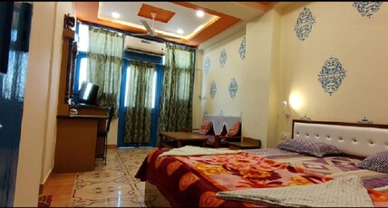 Shivam Guest House Room Type - Deluxe Room with Balcony Shivam Guest House Room Type - Deluxe Room with Balcony