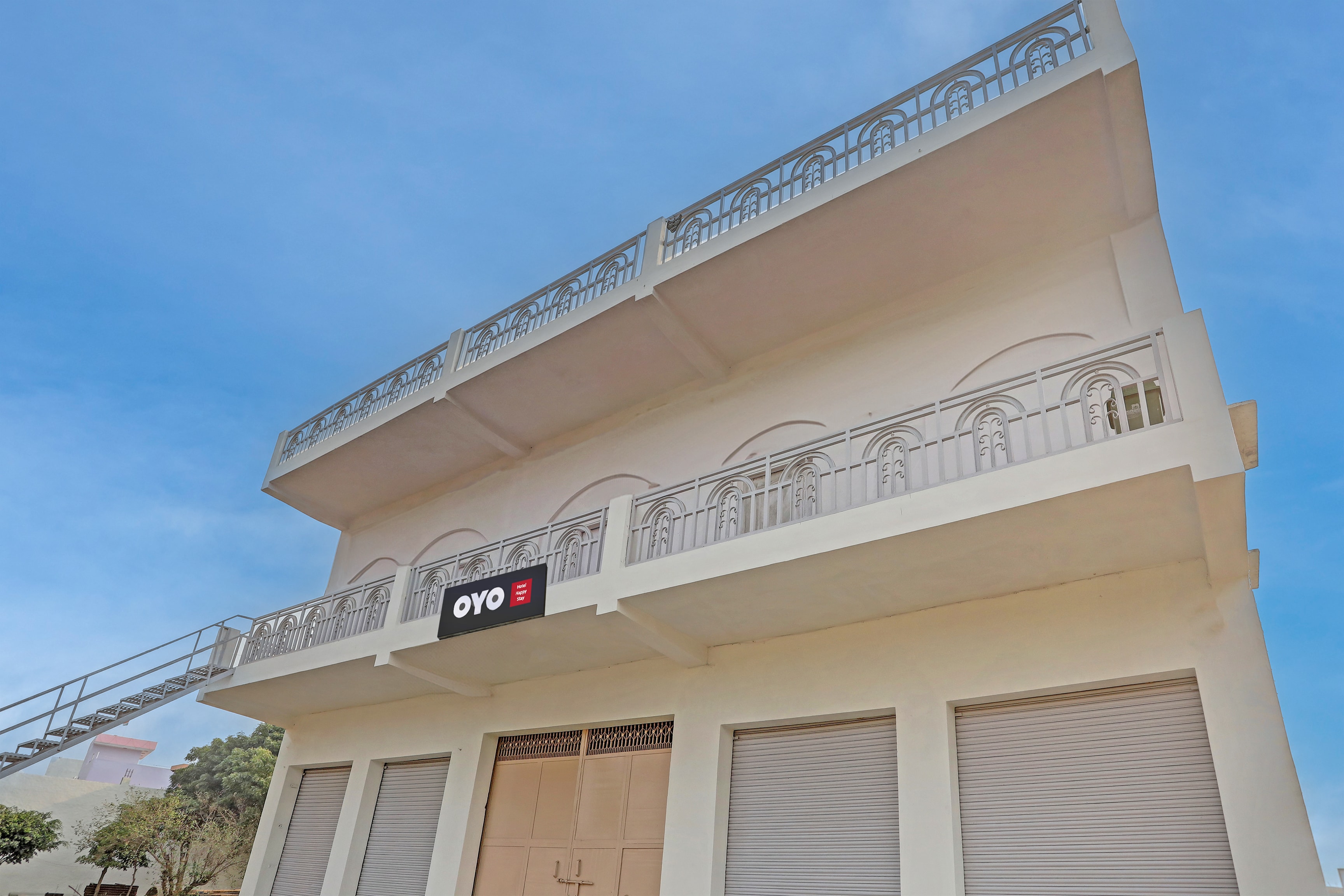 Hotel O HAPPY STAY - Tap to explore photos