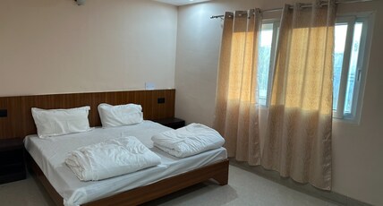 DIWAN INN Room Type - Standard AC Room with Window