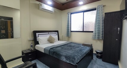 AMBIENT STAY Room Type - Deluxe AC Room