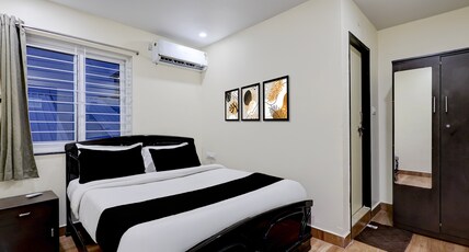 Hotel O Satyam Junction Seethammadhara Room Type - Deluxe Room