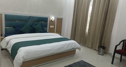 Hotel Mangal Taara Room Type - Deluxe Room with Balcony and Mountain View Hotel Mangal Taara Room Type - Deluxe Room with Balcony and Mountain View