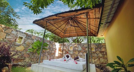 Nature Village Resort Room Type - Nature Hut with Jacuzzi and Private Sit-out