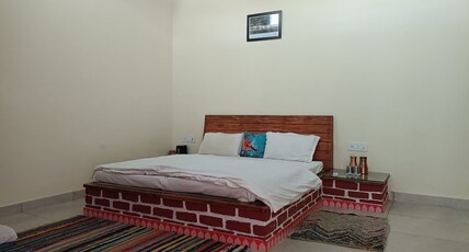 Camp Hornbill Room Type - Woodpecker Stone Cottage with Garden View