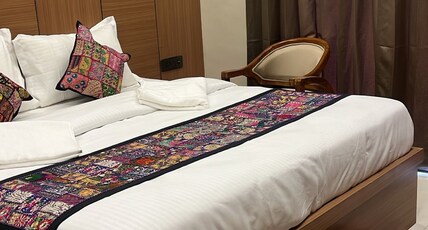 The Mewar By vasundhara Hotels A unit of Tip Top Room Type - Deluxe Room With King Size Bed
