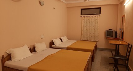 Harsha lodge Room Type - Four Bed Standard NON AC