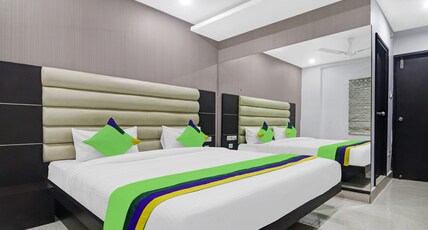 Treebo Kruthika Residency Room Type - Deluxe Family Room