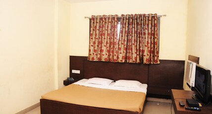 HOTEL GANAPATHI Room Type - Deluxe A/C