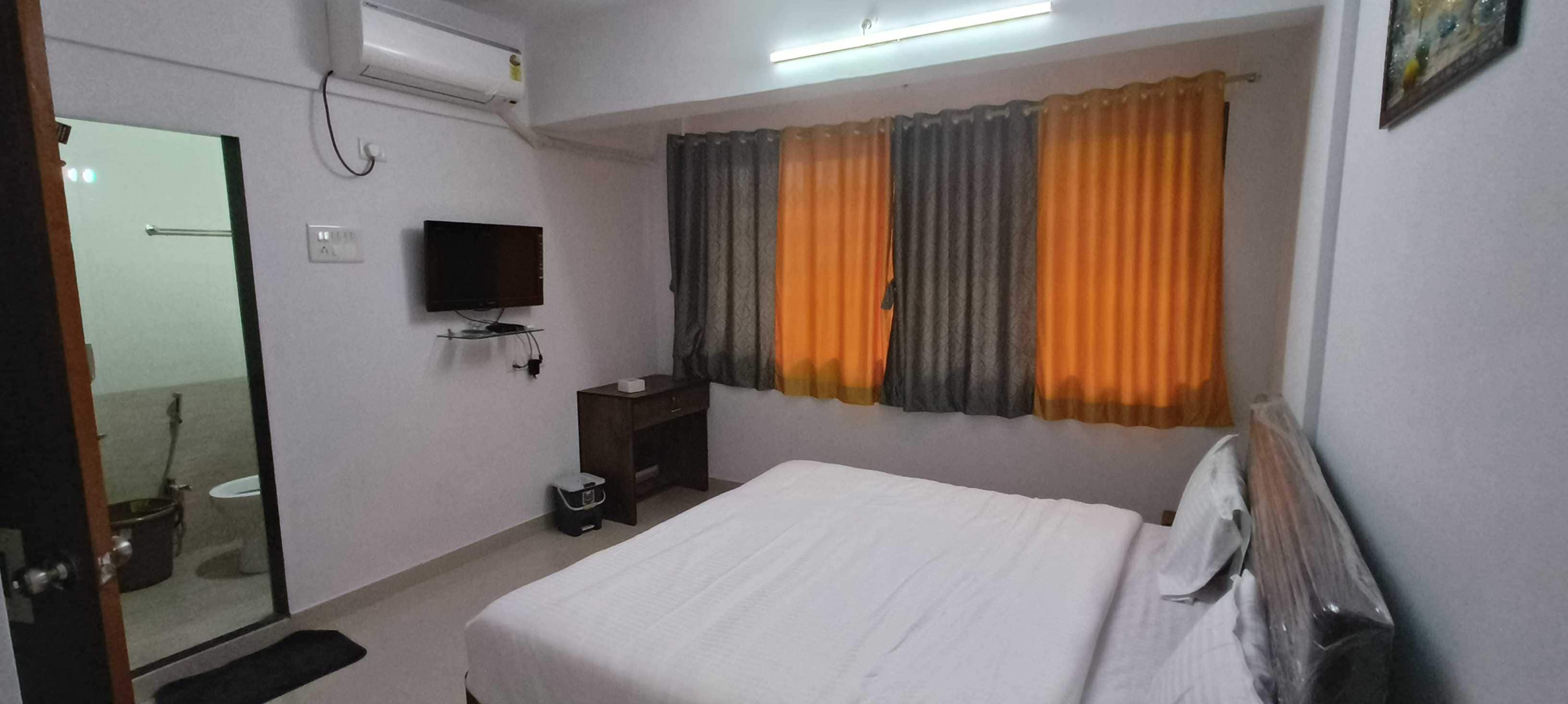 Hotel O Deluxe United Corporate Homes 2 - Tap to explore photos