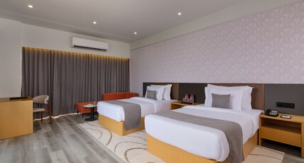 Pride Elite Gandhinagar Room Type - Superior Twin Room