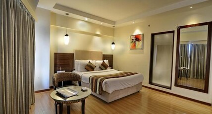 The Altruist Wagholi Hotel Room Type - Deluxe Room