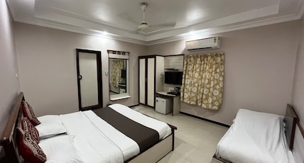 Hotel Parash New (A complete family hotel) Room Type - Super Deluxe 3 Bed Non AC Room (Family and Couples only) Hotel Parash New (A complete family hotel) Room Type - Super Deluxe 3 Bed Non AC Room (Family and Couples only)