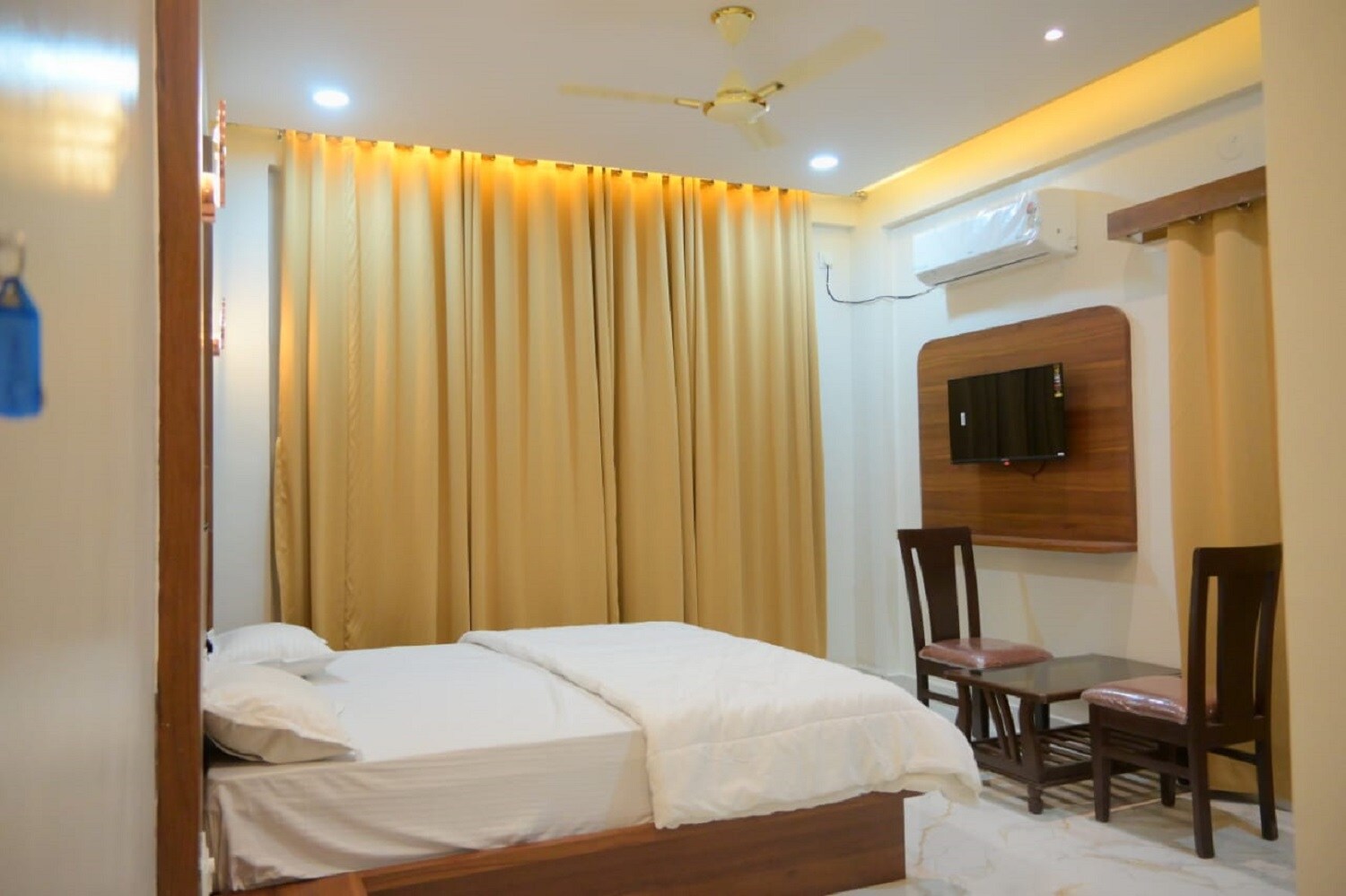 Hotel Amruta - Tap to explore photos