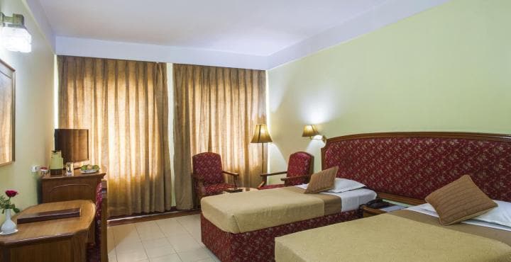 Hotel Kalinga Ashok - Tap to explore photos