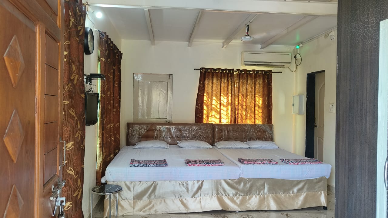 Krushnakunj Holiday Resort, Nagaon - Tap to explore photos
