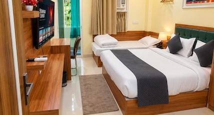 Hotel Vindhya Ganga Inn Room Type - Executive Room Triple Bed With Balcony Hotel Vindhya Ganga Inn Room Type - Executive Room Triple Bed With Balcony