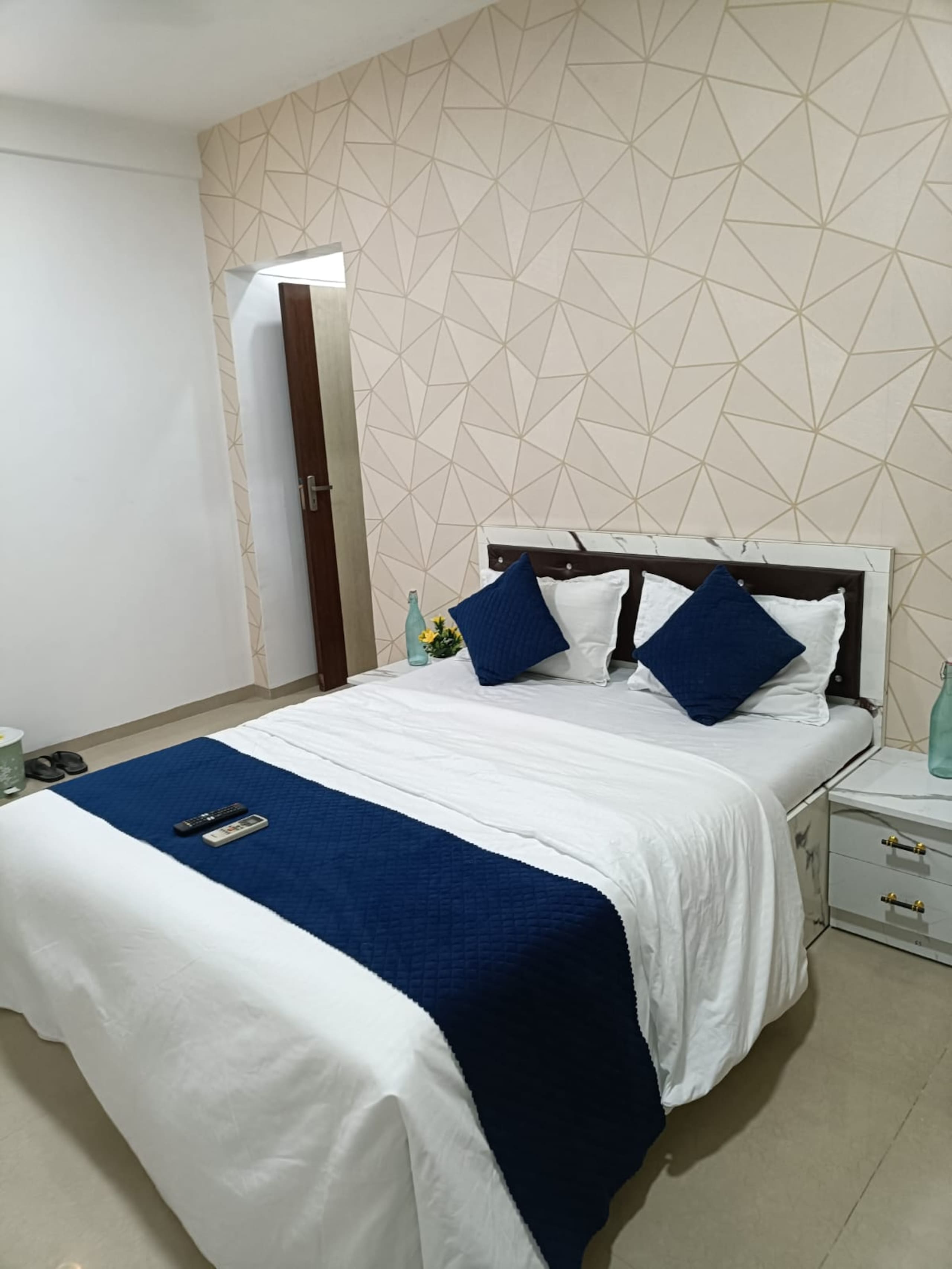 Tulsi Home Aesthetic Deluxe Room attached bathroom - Tap to explore photos