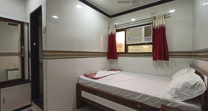 SHIVPOOJA FAMILY LODGE AND RESTAURANT Room Type - Deluxe Non AC Room SHIVPOOJA FAMILY LODGE AND RESTAURANT Room Type - Deluxe Non AC Room