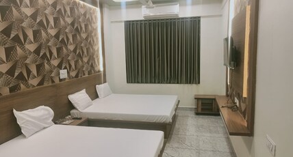 RAJDEEP GUEST HOUSE Room Type - Deluxe Room(King Bed)
