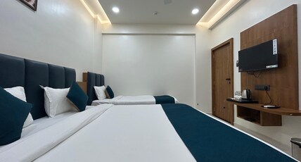 Hotel Kashi Room Type - 3 Bedded AC Family Room (Price is for 3 Adults)