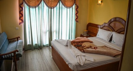 Hotel sun World Room Type - AC Double Room