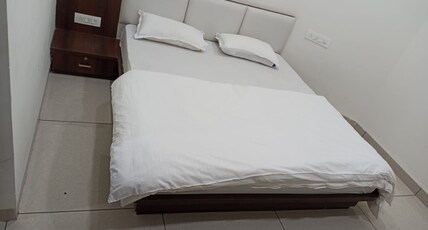 American Guest House Room Type - Super Deluxe AC Room with Garden View Balcony