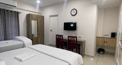DOWN TOWN HOLIDAYS KOVALAM Room Type - Family Comfort Room 203