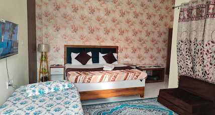 Gangabhumi Homestay Room Type - SUDRISHYA :Family Room -Quadruple Occupancy (Second Floor) Gangabhumi Homestay Room Type - SUDRISHYA :Family Room -Quadruple Occupancy (Second Floor)