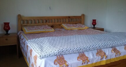 Divine Living | Villa with a Fish Pond Room Type - Deluxe Room With Mountain View