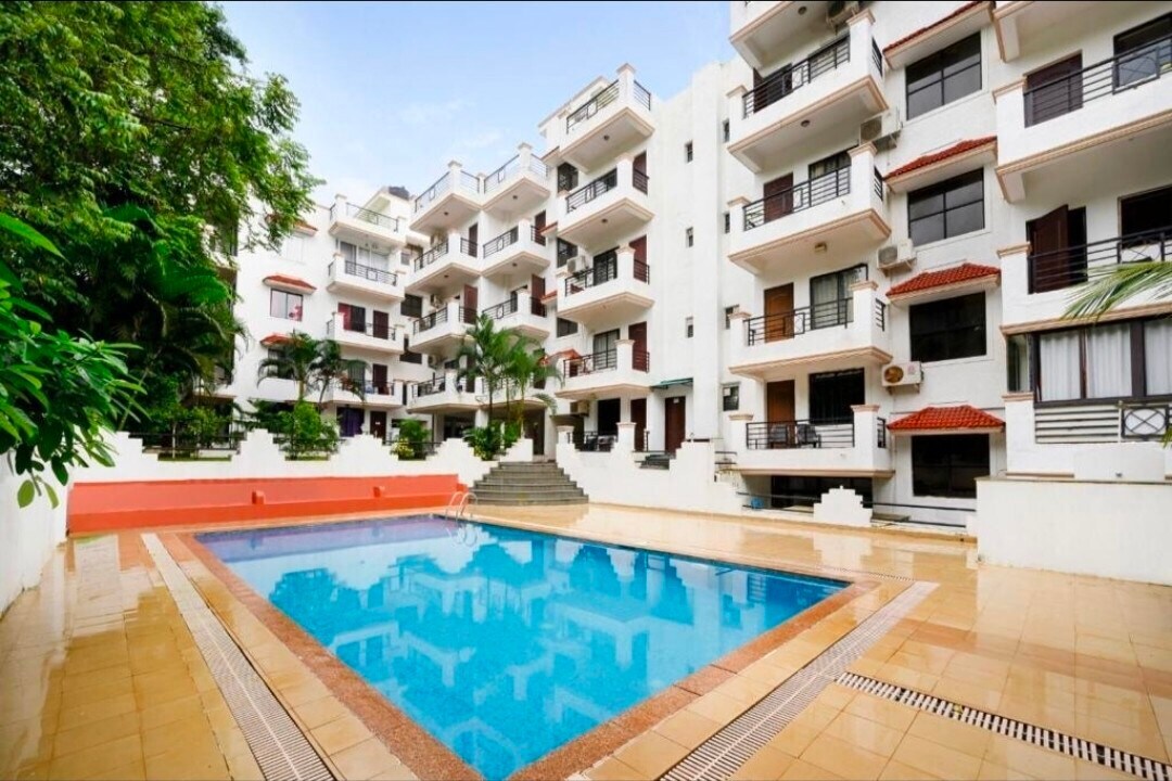 C2 sf4: 2bhk with pool in Vagator by Tanash Homes - Tap to explore photos