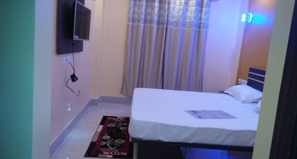 Golden Iris Inn Room Type - Deluxe AC Room